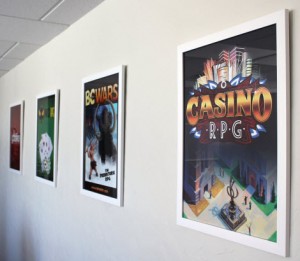 Framed games published by GoldFire Studios in the office in downtown Oklahoma City